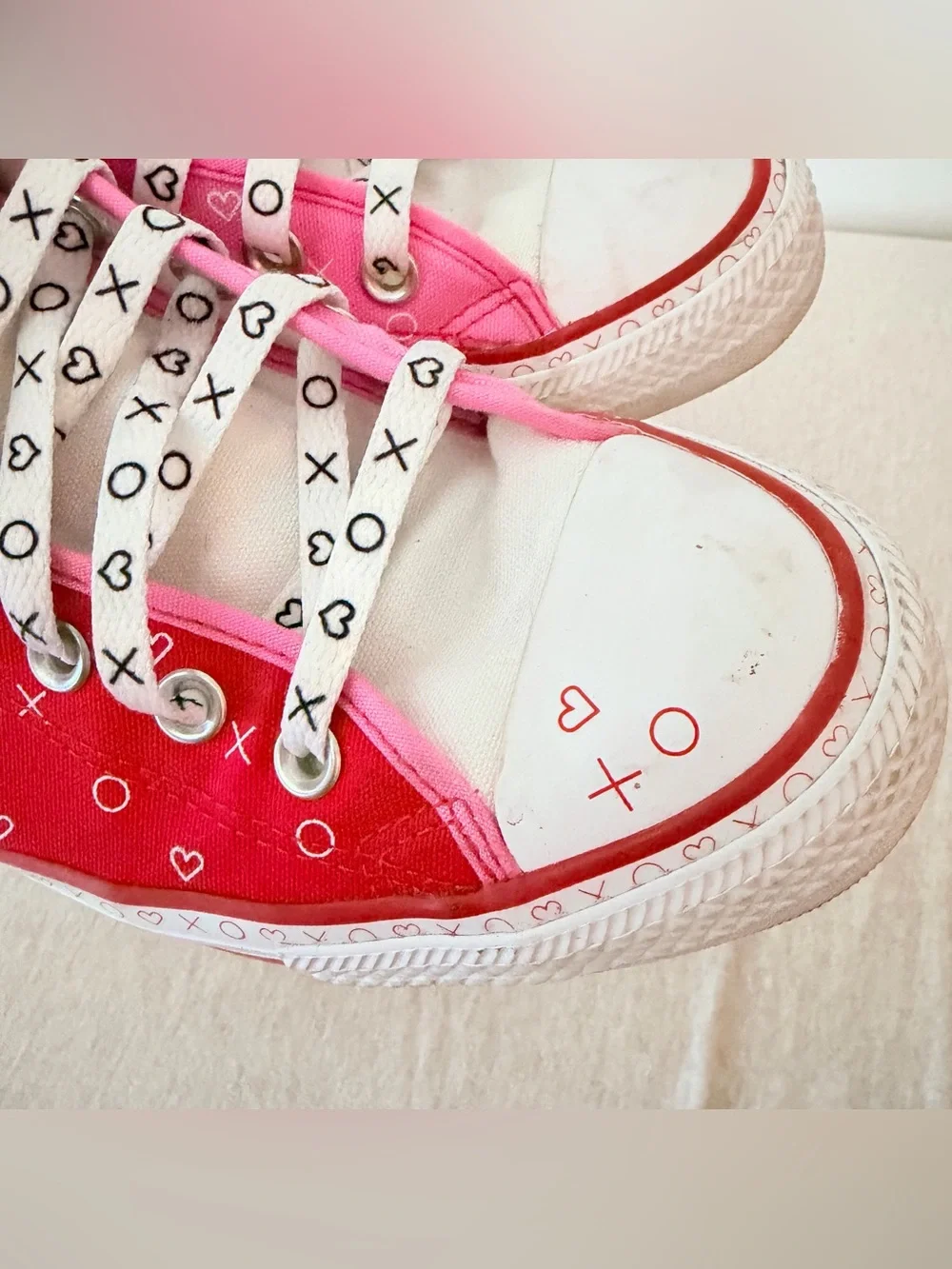 Converse high top half red , half pink “Xoxo” heart print shoes
